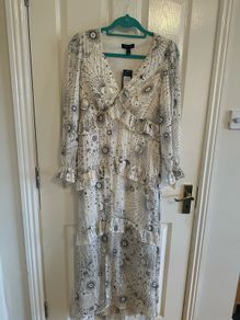 Beautiful white celestial pattern dress with sparkle. Sun and stars. Size 10. New look