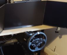 2x monitors paired with monitor arms