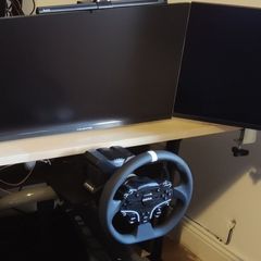2x monitors paired with monitor arms