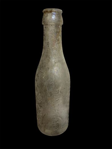 old glass mineral bottle