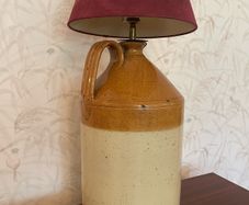 Unique rustic vintage table lamp crafted from a traditional stoneware flago
