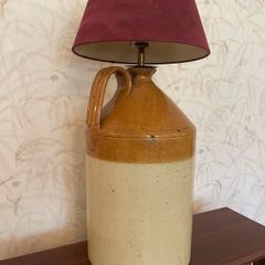 Unique rustic vintage table lamp crafted from a traditional stoneware flago
