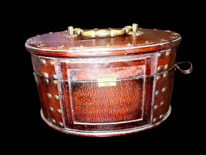 Leather covered antique box with brass