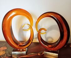 Pair of Mid - Century Murano Amber Glass Love Knot Sculpture.