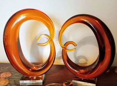 Pair of Mid - Century Murano Amber Glass Love Knot Sculpture.