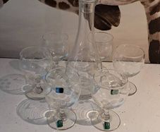 Vintage Irish made decanter and 6 glasses.