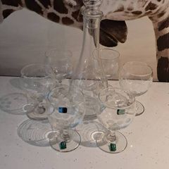 Vintage Irish made decanter and 6 glasses.