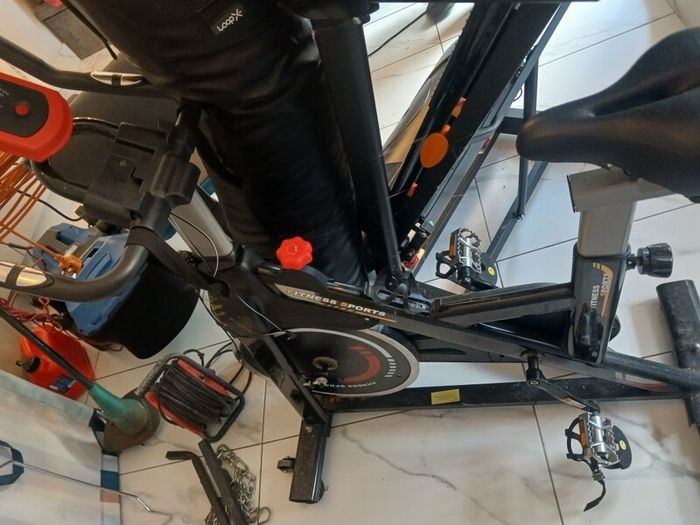 exercise bike , treadmill bench  weights boxing bag