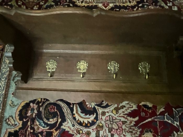 Old coat rack with brass hooks, large and heavy