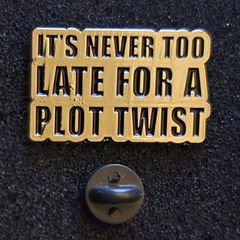 Plot twist  !, pin back badge.