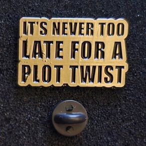 Plot twist  !, pin back badge.