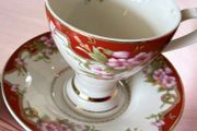 Stunning Porcelain Teacup and Saucer Set of 2 Red and Floral Design