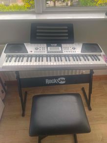 Rock Jam keyboard with a stand and a stool