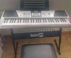 Rock Jam keyboard with a stand and a stool