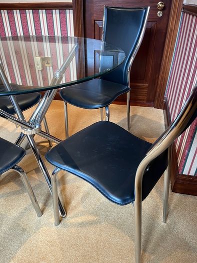 Tempered glass table and 4 matching chairs