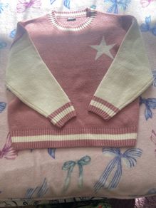 Pink jumper with star