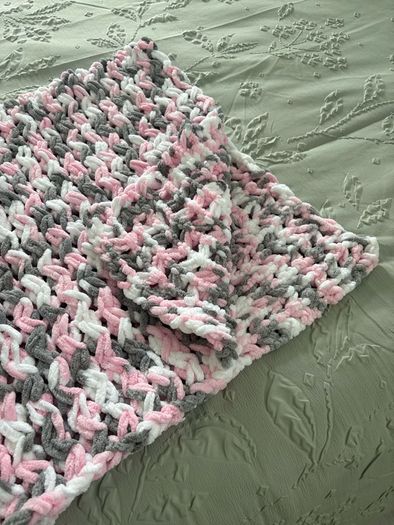hand knitted baby blankets and cardigans