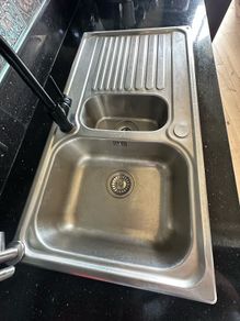 kitchen sink and black tap