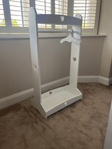 Kids dressing rail with hangers