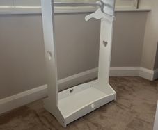 Kids dressing rail with hangers
