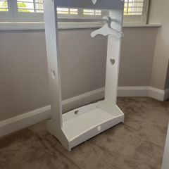 Kids dressing rail with hangers