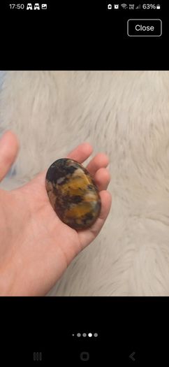 black and yellow tourmaline in quartz palmstone