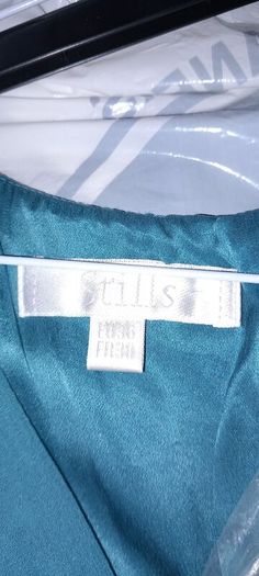Turquoise knee length silk dress