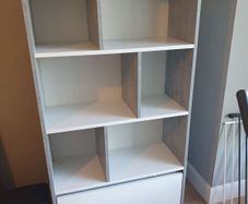 Shelving unit with drawer shelves