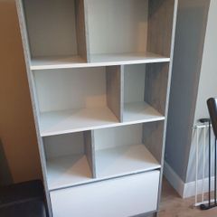 Shelving unit with drawer shelves