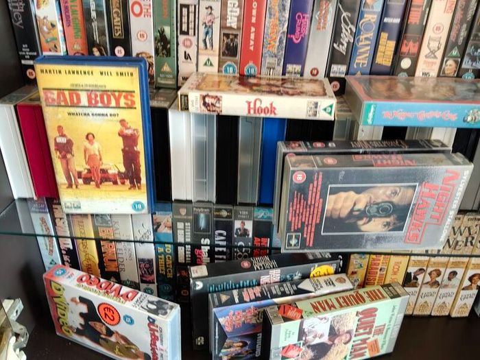 action figure, graphic novel, toys,books, VHS massive collection