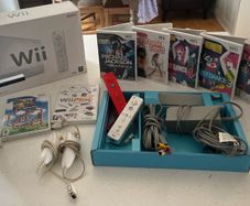 wii console , games and 2 controllers