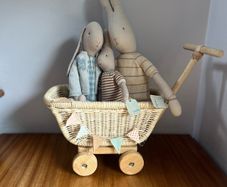 maileg bunny family in rattan trug.