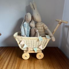 maileg bunny family in rattan trug.