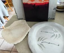3 items- Vintage Red Dead Redemption Red Dead Redemption Metal Sign Retro Wall Decor 15.00 euro ,  carved stone decorative bowl, possibly made of alabaster or marble euro 45.00. .Large ovel plate could use as platter 15.00 euro.