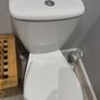 Bathroom sink, toilet, radiator Image 9