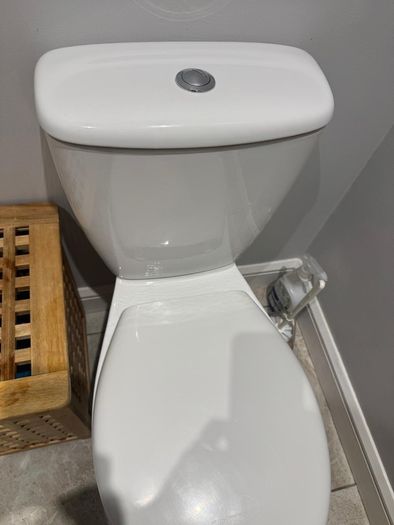 Bathroom sink, toilet, radiator