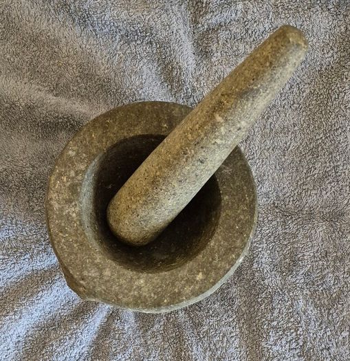 Vintage granite pestle and mortar. Very heavy.