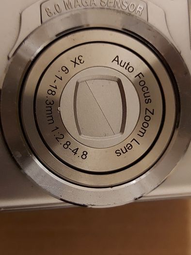 Z880 Digital Camera, Takes 2AA Batteries, working fine, has a modification that doesn't affect its performance
