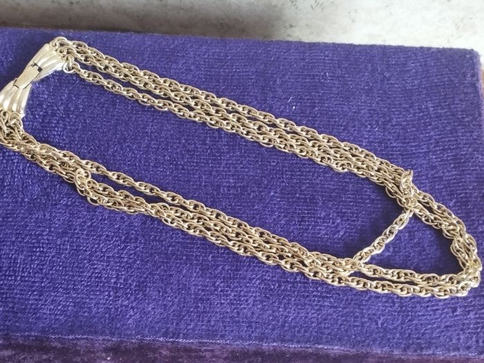 Vintage gold tone multi chain necklace with beautiful clasp.