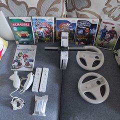 Wii + Mario Kart + Steering wheels + Smash Brawls