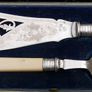 Vintage Boxed set of Faux Bone Handled Fish Servers with Hallmarked Silver Collars - 2 Pieces Image 3