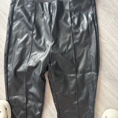 leather look trousers