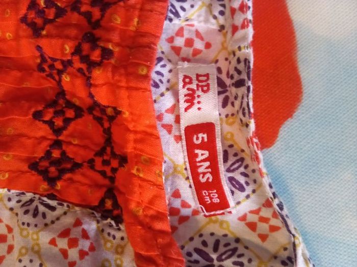 DP...am beautiful orange top with pretty details