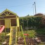 Playhouse with look out tower, swings, slide, picnic table Image 3