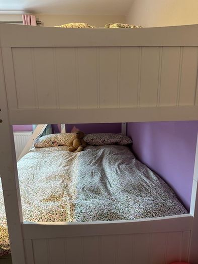 Triple bunk bed.