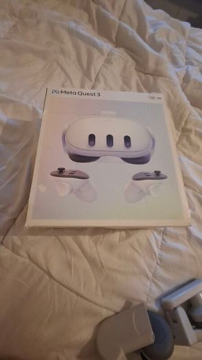 meta quest 3 with controllers and earmuffs, all working good condition