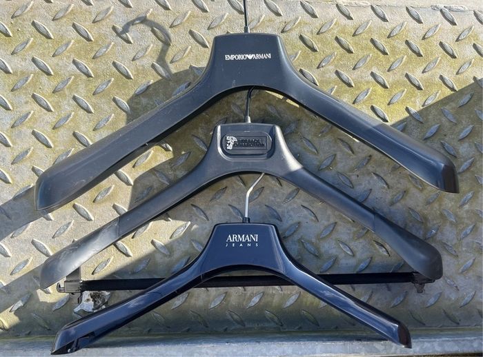 Armani Versace Hugo Boss clothes coat trousers Hangers