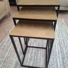 Brand new nest of Tables Brass with black lefs