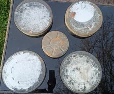 5 vintage film reel cannisters