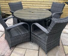 4 Seater Rattan Garden Dining Set including seat cushions, and cover for Winter.